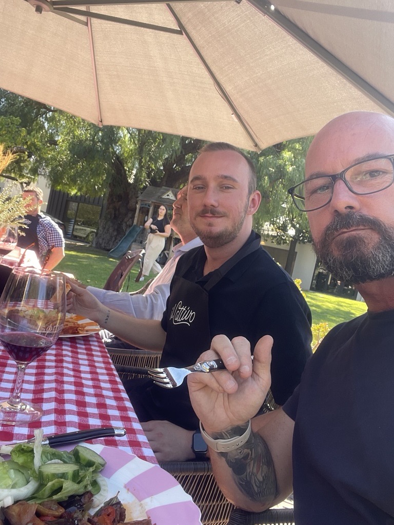 Our buying team tasting wine at the table