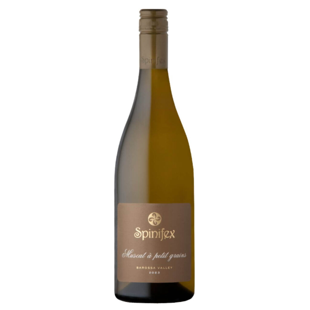 Bottle of Spinifex Muscat à petit grain from Barossa Valley, 2023 (white wine) with gold label visible on a clear glass bottle
