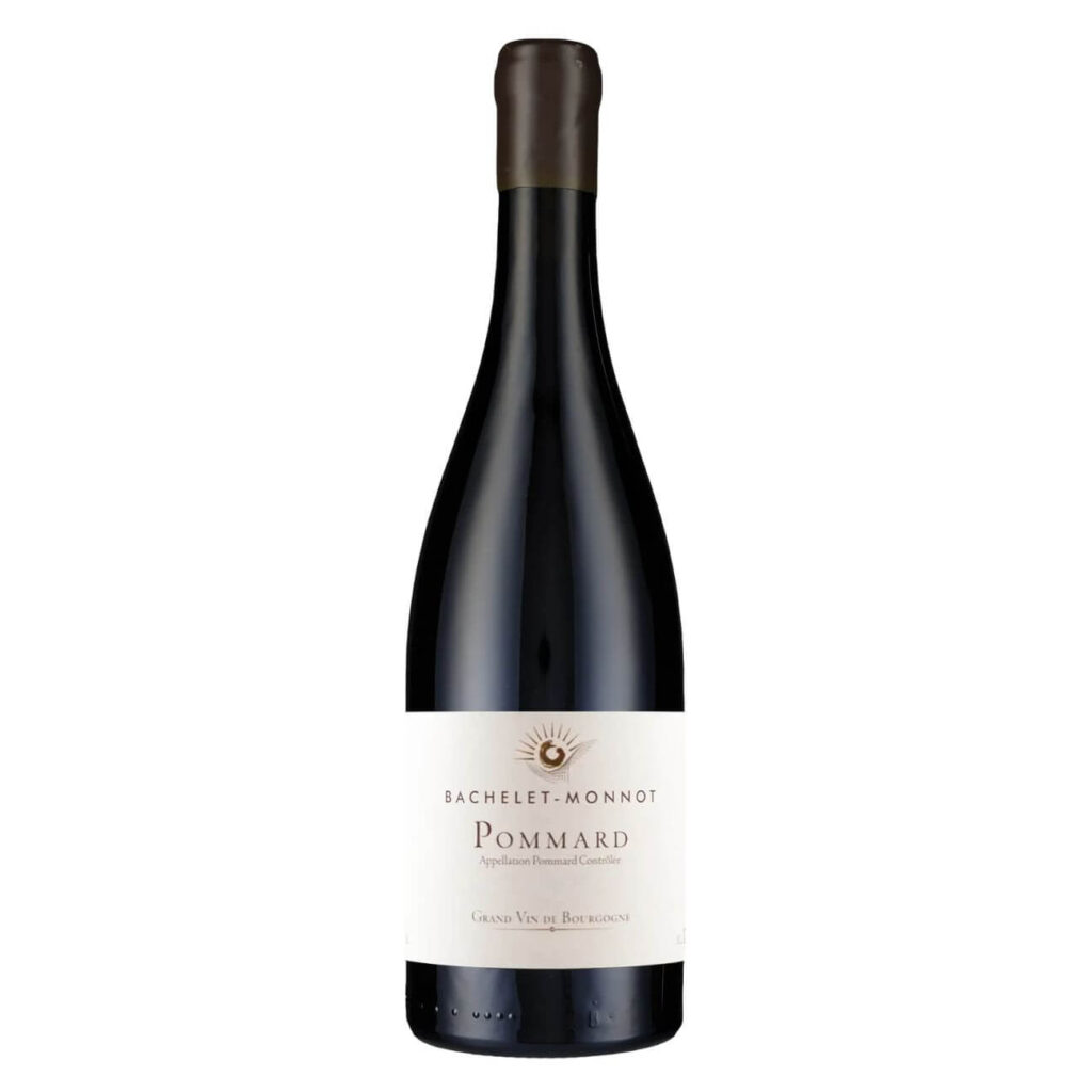 Full-length image of a dark wine bottle with a cream label reading 'Bachelet-Monnot Pommard Grand Vin de Bourgogne'