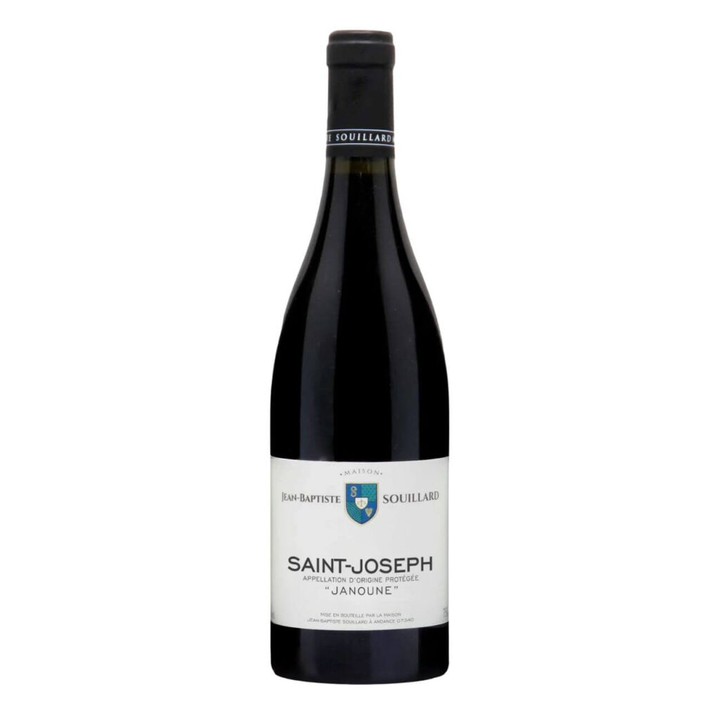 Bottle of Saint-Joseph red wine with white label reading "Saint-Joseph" and crest, bottled by Jean-Baptiste Souillard, name "Janoune" on the label